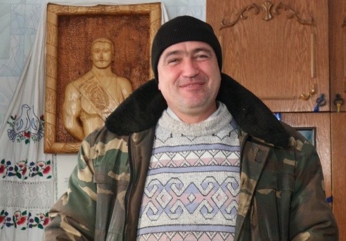 Голова ФГ "ОлПід" Олександр Піддубний з портретом легендарного родича